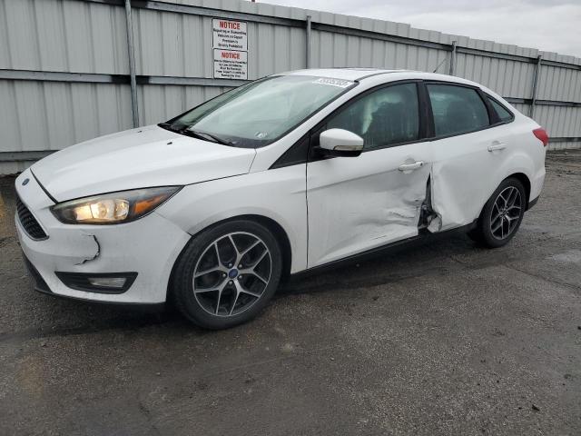 FORD FOCUS SEL 2017 with VIN 1FADP3H28HL209507 - Photo from auction