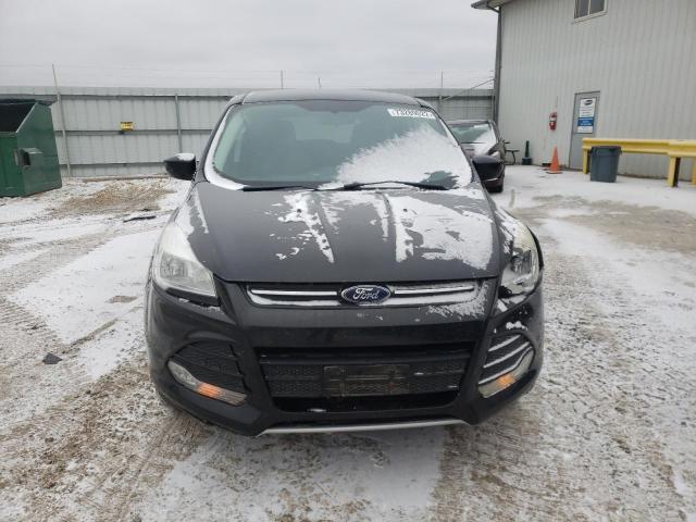 Photo 5 from auction – 2015 FORD ESCAPE SE with VIN 1FMCU9G90FUB64727