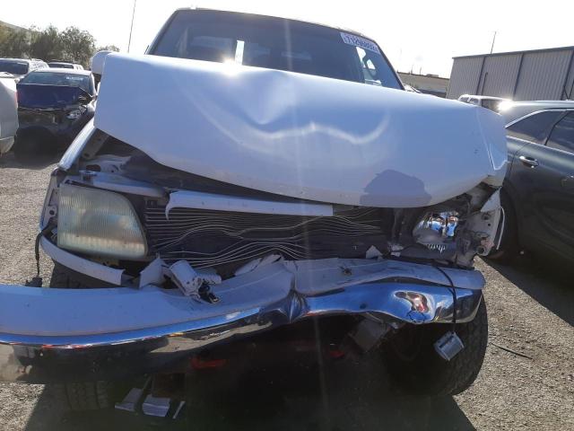 Photo 5 from auction – 2003 FORD F150 SUPER with VIN 1FTRW08L83KB70054