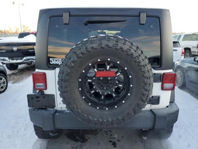 Photo 6 from auction – 2016 JEEP WRANGLER U with VIN 1C4BJWDG7GL323728