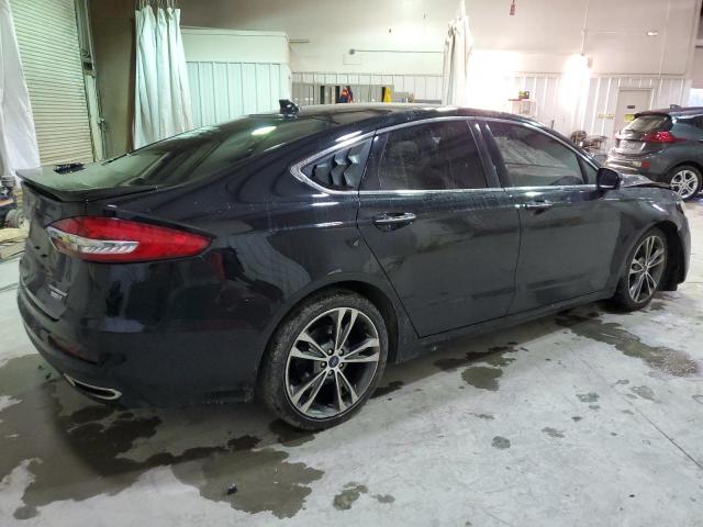 Photo 3 from auction – 2019 FORD FUSION TIT with VIN 3FA6P0D92KR239699