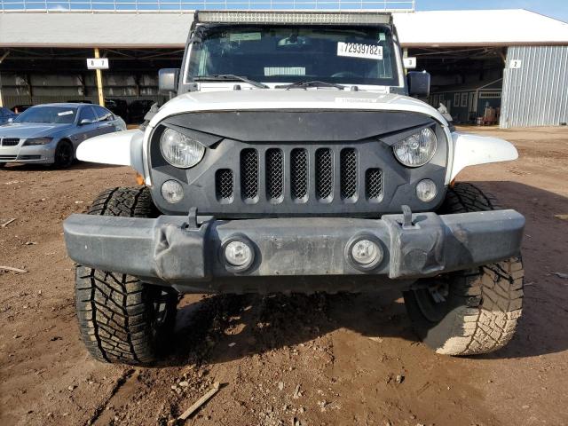 Photo 5 from auction – 2015 JEEP WRANGLER U with VIN 1C4BJWDG4FL675020