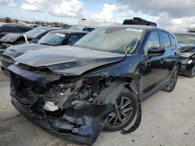MAZDA CX-5 TOURI 2018 with VIN JM3KFACM9J1475032 - Photo from auction