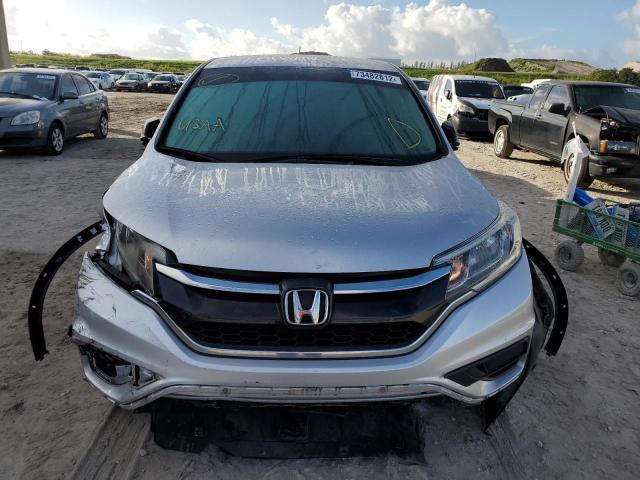 Photo 5 from auction – 2016 HONDA CR-V LX with VIN 2HKRM3H30GH569326