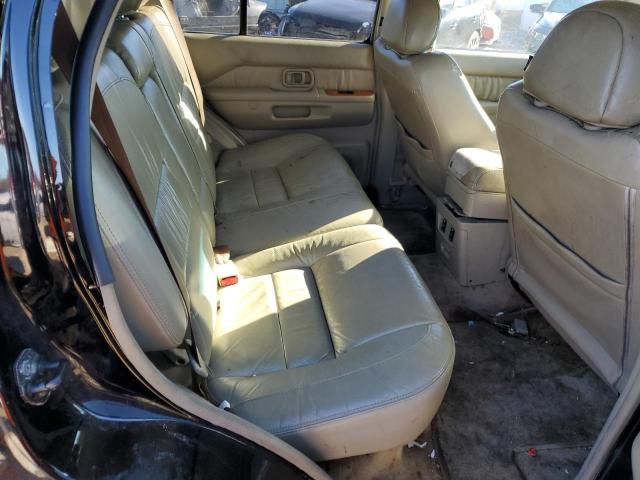 Photo 11 from auction – 2003 INFINITI QX4 with VIN JNRDR09Y73W302550