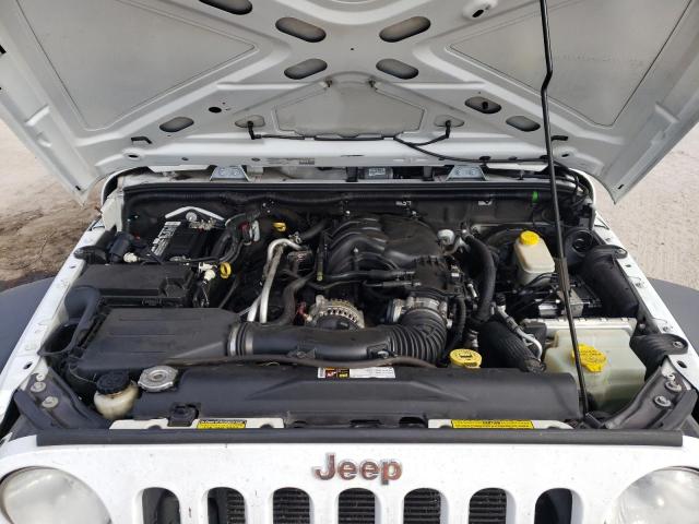 Photo 12 from auction – 2014 JEEP WRANGLER U with VIN 1C4BJWDG0EL232541