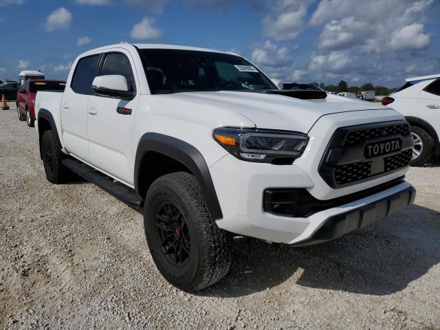 Photo 4 from auction – 2021 TOYOTA TACOMMA with VIN 5TFCZ5AN6MX258577