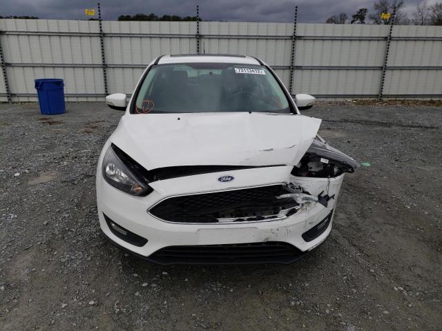 Photo 5 from auction – 2015 FORD FOCUS SE with VIN 1FADP3K29FL290068