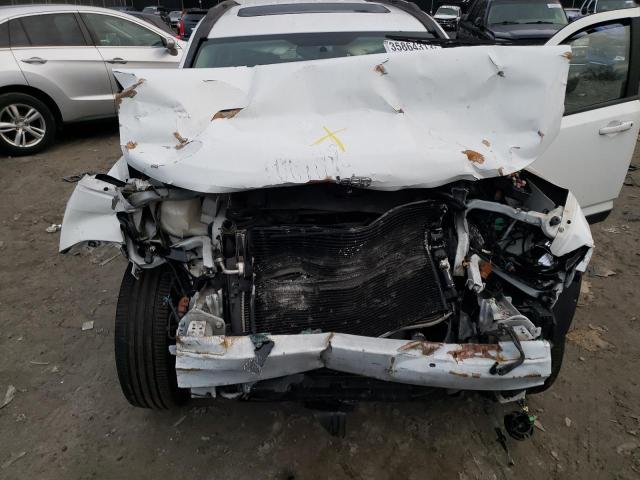 Photo 12 from auction – 2015 JEEP COMPASS LA with VIN 1C4NJDEBXFD154835