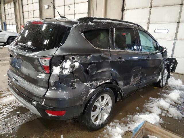 Photo 3 from auction – 2017 FORD ESCAPE SE with VIN 1FMCU9GD4HUB23928