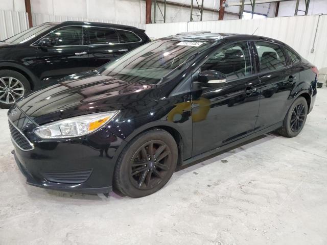 FORD FOCUS SE 2017 with VIN 1FADP3F24HL283235 - Photo from auction