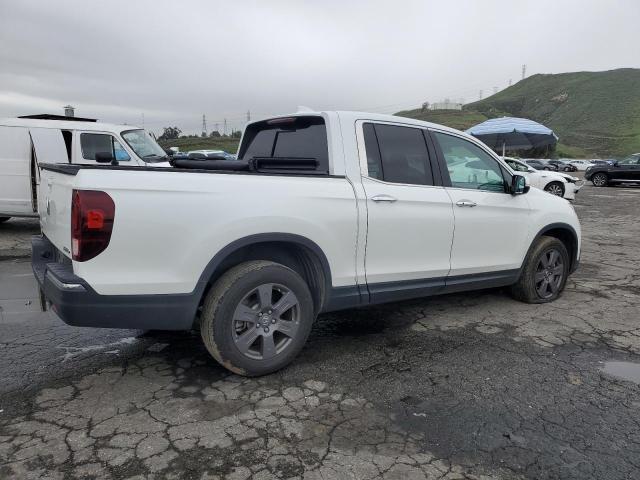 Photo 3 from auction – 2020 HONDA RIDGELINE with VIN 5FPYK3F71LB012349