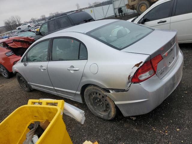 Photo 2 from auction – 2011 HONDA CIVIC LX with VIN 19XFA1F52BE036038