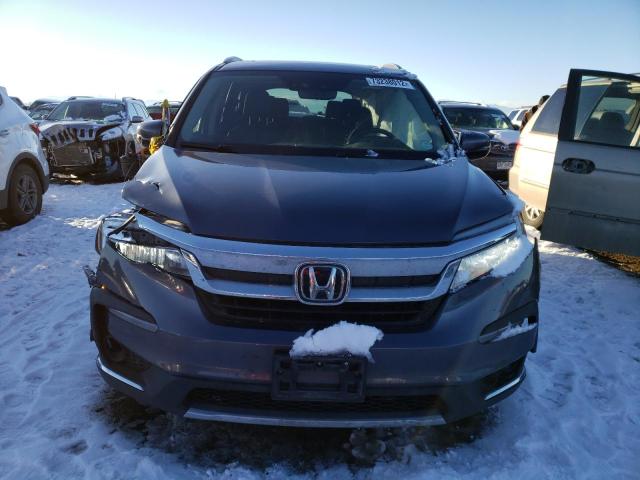 Photo 5 from auction – 2021 HONDA PILOT ELIT with VIN 5FNYF6H04MB004911