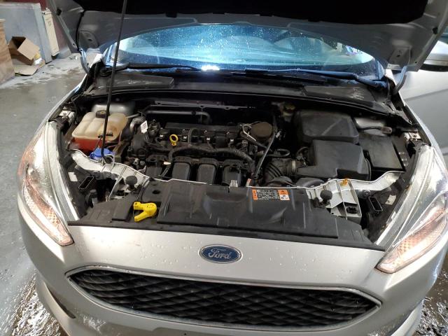 Photo 11 from auction – 2015 FORD FOCUS SE with VIN 1FADP3F24FL297665