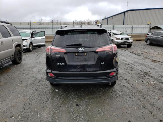 Photo 6 from auction – 2018 TOYOTA RAV4 LE with VIN 2T3ZFREV9JW473102