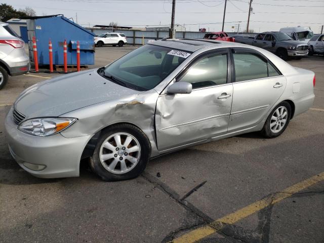 TOYOTA CAMRY LE 2003 with VIN 4T1BF30KX3U050424 - Photo from auction