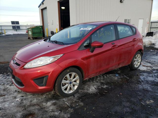 FORD FIESTA 2011 with VIN 3FADP4EJ2BM228688 - Photo from auction