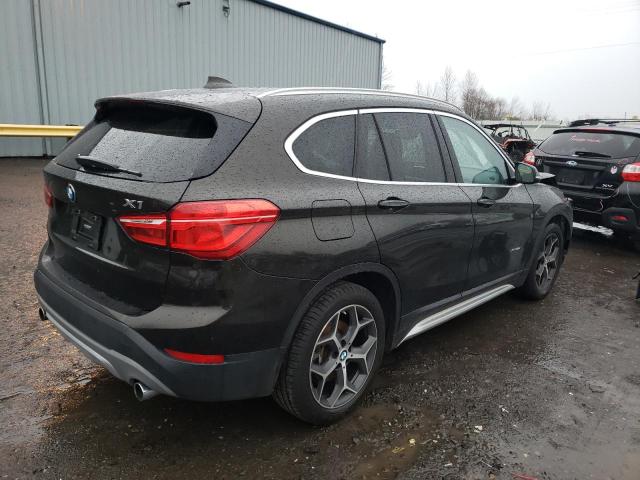 Photo 3 from auction – 2016 BMW X1 XDRIVE2 with VIN WBXHT3C3XG5E51019