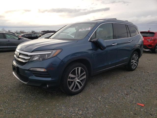 HONDA PILOT TOUR 2017 with VIN 5FNYF6H98HB086498 - Photo from auction