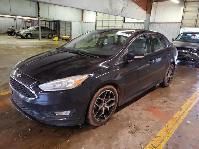 FORD FOCUS SE 2016 with VIN 1FADP3F24GL296579 - Photo from auction