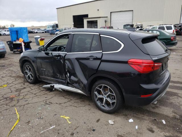 Photo 2 from auction – 2018 BMW X1 XDRIVE2 with VIN WBXHT3C3XJ5F91806