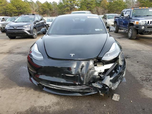 Photo 5 from auction – 2021 TESLA MODEL 3 with VIN 5YJ3E1EA7MF985331