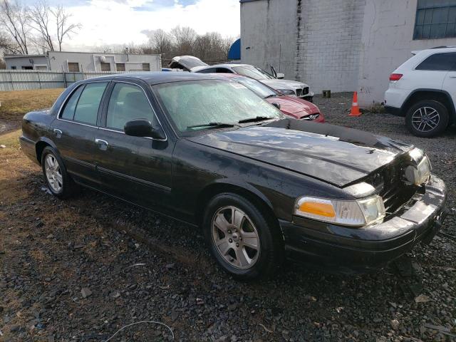 Photo 4 from auction – 2011 FORD CROWN VICT with VIN 2FABP7EV5BX166039