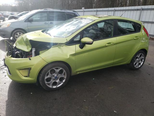 FORD FIESTA SES 2011 with VIN 3FADP4FJ7BM141707 - Photo from auction