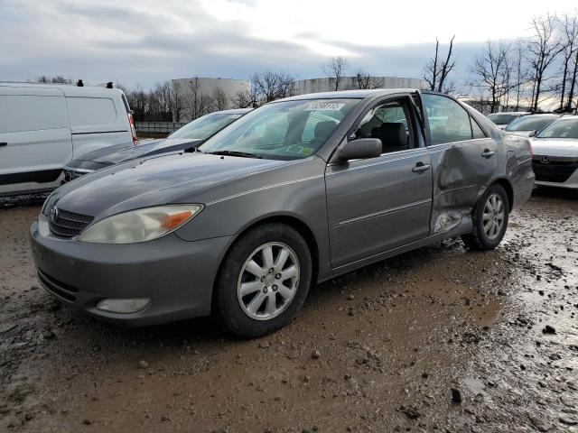 TOYOTA CAMRY LE 2004 with VIN 4T1BF30K64U581900 - Photo from auction