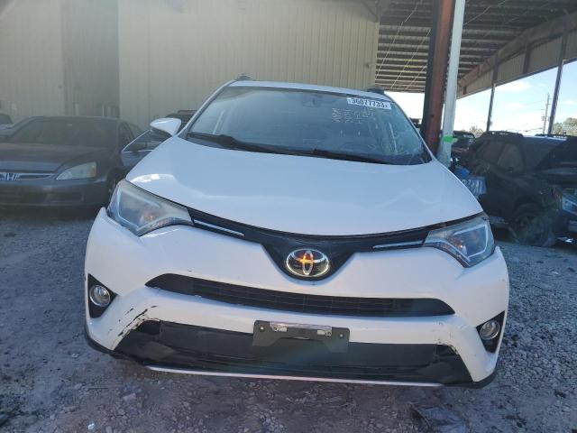 Photo 5 from auction – 2017 TOYOTA RAV4 XLE with VIN JTMWFREV6HJ705280