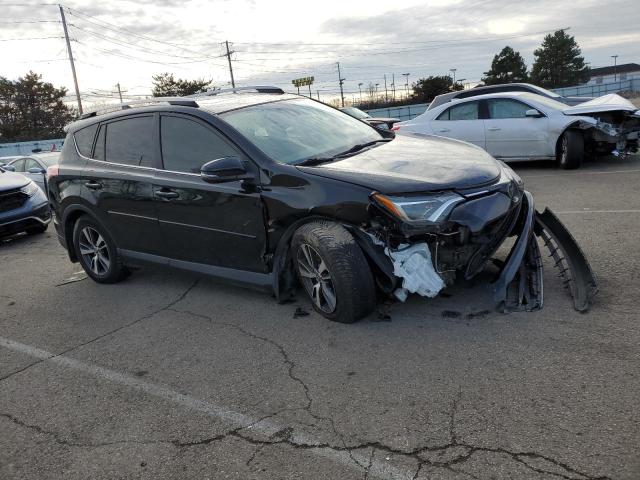 Photo 4 from auction – 2017 TOYOTA RAV4 XLE with VIN 2T3RFREV8HW612940