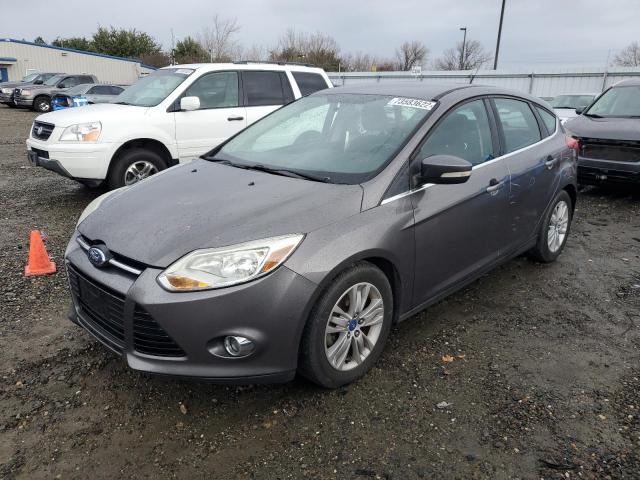 FORD FOCUS SEL 2012 with VIN 1FAHP3M23CL263040 - Photo from auction