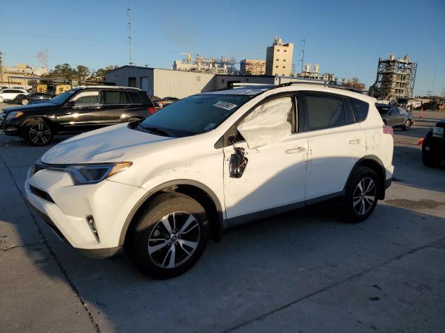 TOYOTA RAV4 XLE 2017 with VIN JTMWFREV8HD096045 - Photo from auction