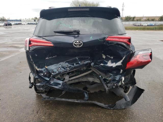 Photo 6 from auction – 2017 TOYOTA RAV4 XLE with VIN JTMWFREV9HJ115252