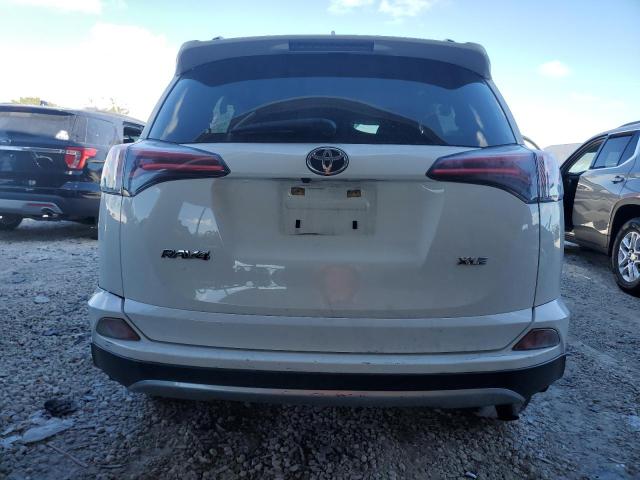 Photo 6 from auction – 2017 TOYOTA RAV4 XLE with VIN JTMWFREV6HJ705280