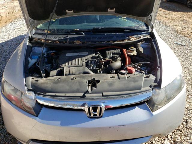 Photo 11 from auction – 2006 HONDA CIVIC HYBR with VIN JHMFA36236S012284