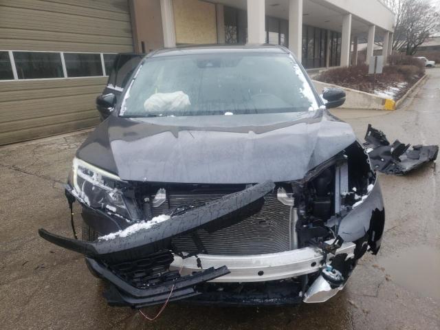 Photo 5 from auction – 2021 HONDA PASSPORT E with VIN 5FNYF8H52MB040961