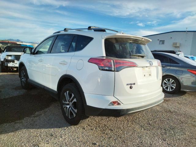 Photo 2 from auction – 2016 TOYOTA RAV4 LE with VIN JTMZFREV9GJ095032