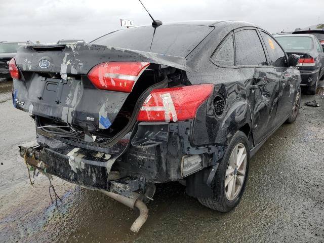 Photo 3 from auction – 2018 FORD FOCUS SE with VIN 1FADP3F22JL273468