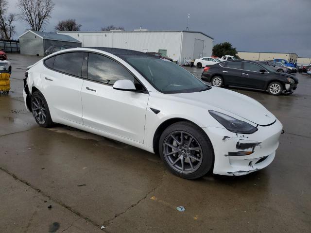 Photo 4 from auction – 2022 TESLA MODEL 3 with VIN 5YJ3E1EB9NF135419