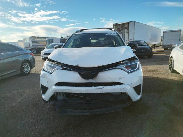 Photo 5 from auction – 2016 TOYOTA RAV4 LE with VIN JTMZFREV9GJ095032