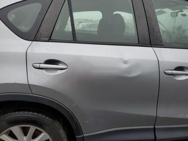 Photo 11 from auction – 2014 MAZDA CX-5 SPORT with VIN JM3KE4BE1E0415708
