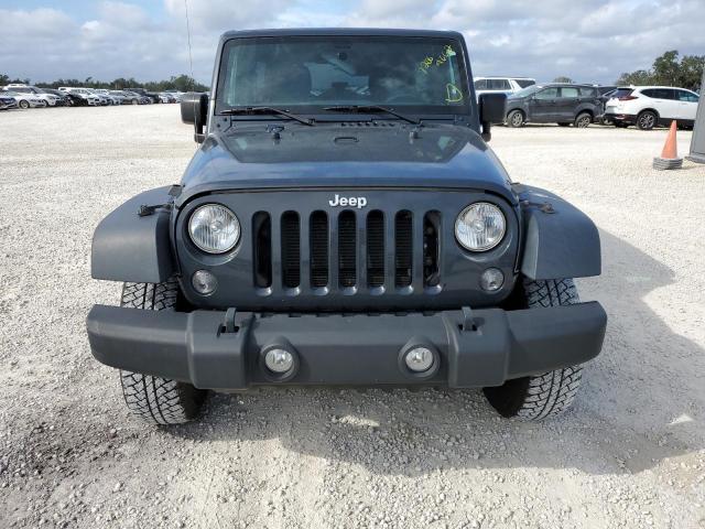 Photo 5 from auction – 2016 JEEP WRANGLER U with VIN 1C4BJWDG4GL321273