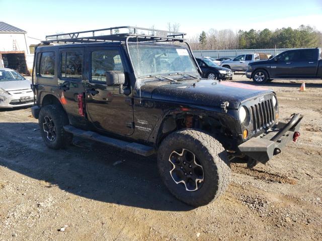 Photo 4 from auction – 2011 JEEP WRANGLER U with VIN 1J4BA5H13BL594241