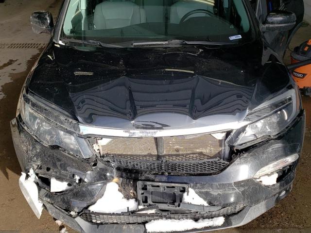 Photo 12 from auction – 2016 HONDA PILOT with VIN 5FNYF6H57GB037594