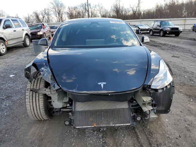 Photo 5 from auction – 2022 TESLA MODEL 3 with VIN 5YJ3E1EC7NF233454