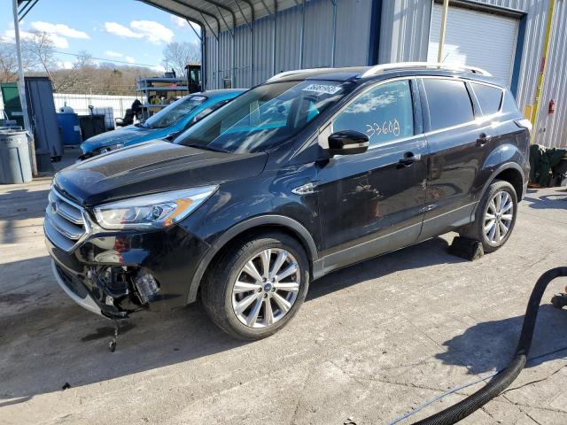 FORD ESCAPE TIT 2017 with VIN 1FMCU9JD0HUC13599 - Photo from auction