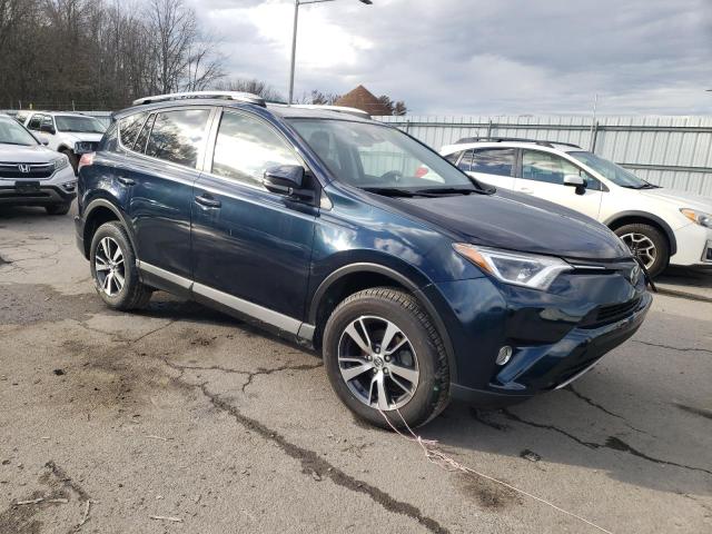 Photo 4 from auction – 2017 TOYOTA RAV4 XLE with VIN JTMRFREV2HD198647