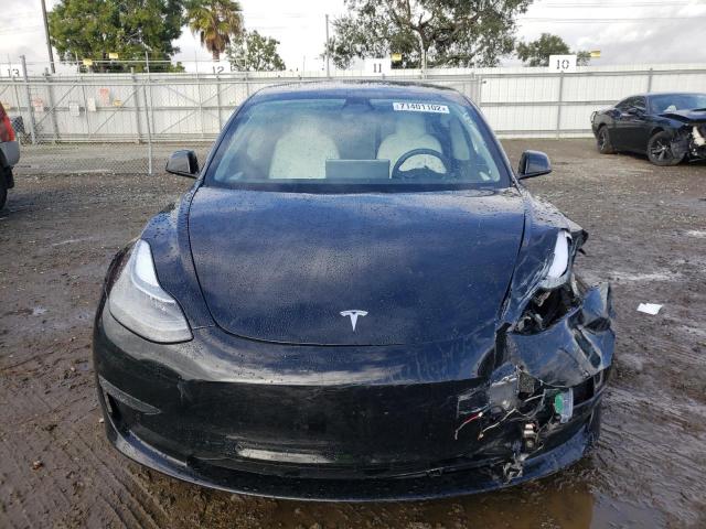 Photo 5 from auction – 2021 TESLA MODEL 3 with VIN 5YJ3E1EA6MF018287
